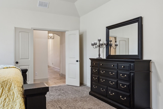 1685 Laramie Ln, Burleson, TX 76028 - tiled bedroom with carpet, baseboards, and arched walkways