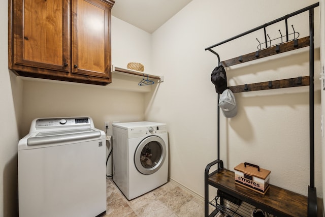 1685 Laramie Ln, Burleson, TX 76028 - laundry area with washer and clothes dryer, cabinet space, and baseboards