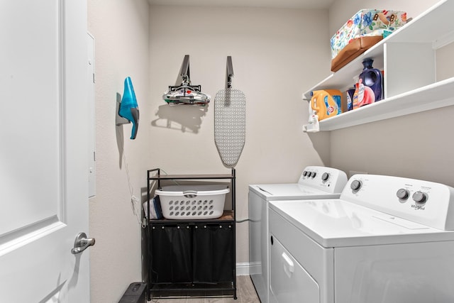 601 Big Horn Pass, Denton, TX 76210 - washroom featuring washing machine and dryer and wood finished floors