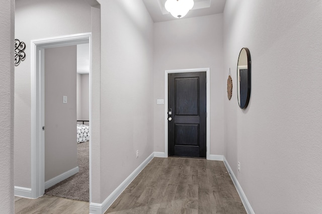 601 Big Horn Pass, Denton, TX 76210 - doorway to outside featuring wood finished floors and baseboards