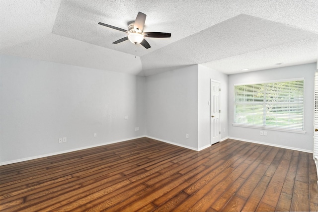 120 Royalwood Dr, Mabank, TX 75156 - spare room with a textured ceiling, a ceiling fan, dark wood finished floors, and baseboards