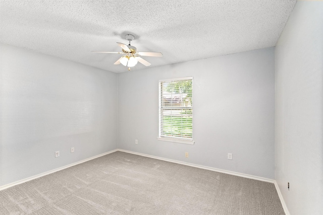 120 Royalwood Dr, Mabank, TX 75156 - carpeted empty room with a ceiling fan, baseboards, and a textured ceiling