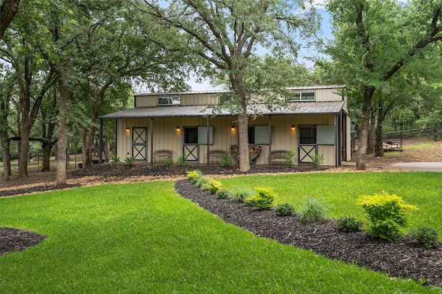 6815 Fm 1830, Argyle, TX 76226 - view of front of home featuring board and batten siding, a metal roof, and a porch