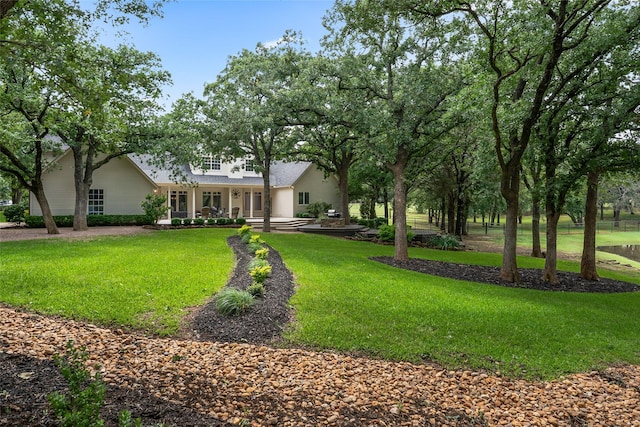6815 Fm 1830, Argyle, TX 76226 - view of front of home with a porch and a front lawn