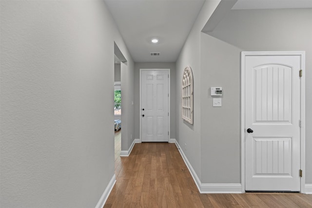 7885 Hickory Branch Dr, Frisco, TX 75034 - hall featuring baseboards and wood finished floors