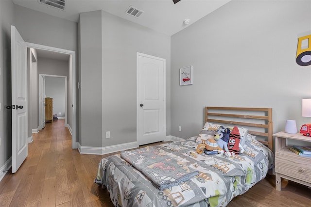 7885 Hickory Branch Dr, Frisco, TX 75034 - bedroom with wood finished floors and baseboards