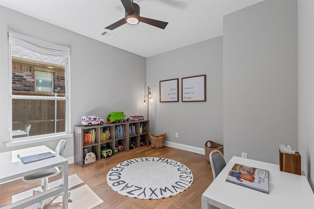 7885 Hickory Branch Dr, Frisco, TX 75034 - home office featuring a ceiling fan, wood finished floors, and baseboards
