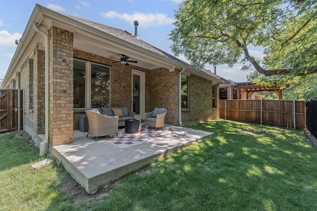 7885 Hickory Branch Dr, Frisco, TX 75034 - rear view of house with ceiling fan, outdoor lounge area, a patio area, and stone siding
