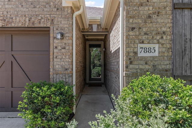 7885 Hickory Branch Dr, Frisco, TX 75034 - view of exterior entry featuring brick siding