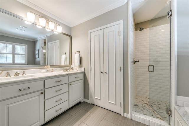 5022 W Hanover Ave, Dallas, TX 75209 - bathroom with double vanity, a shower stall, and ornamental molding