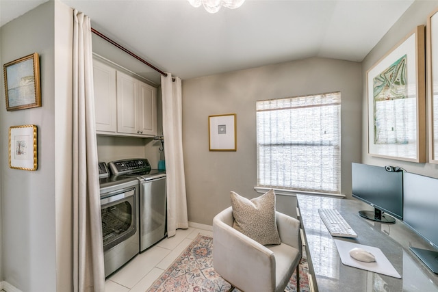 5022 W Hanover Ave, Dallas, TX 75209 - washroom featuring washing machine and clothes dryer, cabinet space, light tile patterned flooring, and baseboards