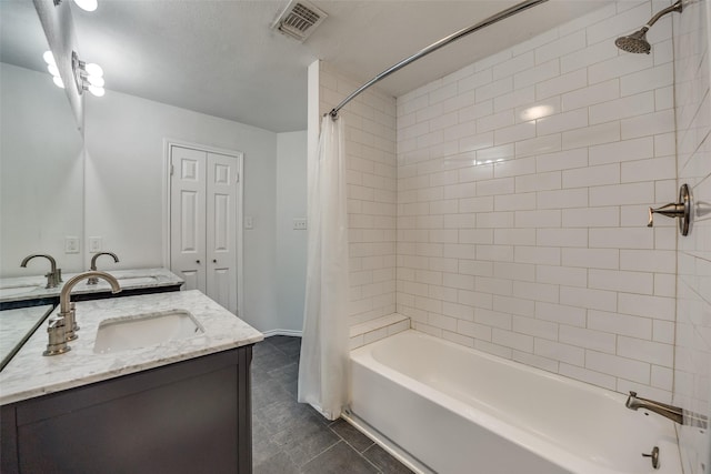 630 W Canty St Unit B6, Dallas, TX 75208 - bathroom featuring shower / bathtub combination with curtain, double vanity, baseboards, and tile patterned flooring