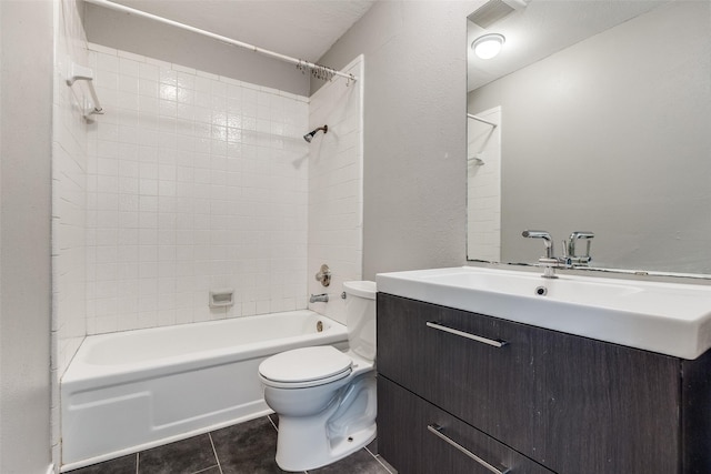 630 W Canty St Unit B6, Dallas, TX 75208 - bathroom with toilet, tile patterned floors, vanity, and washtub / shower combination