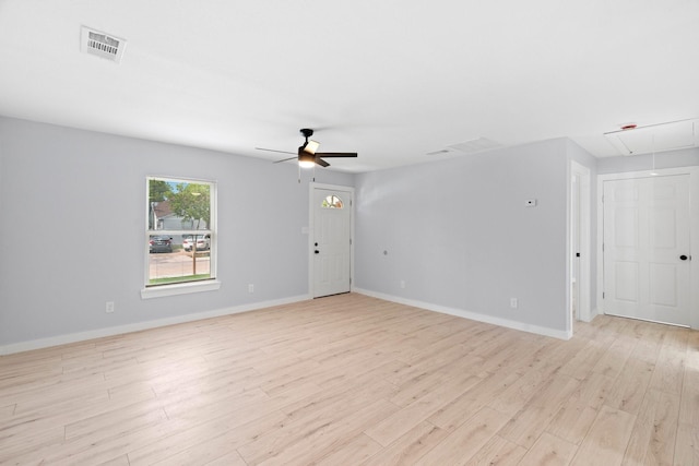 3812 Burton Ave, Fort Worth, TX 76105 - unfurnished room with attic access, light wood-type flooring, ceiling fan, and baseboards