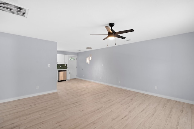 3812 Burton Ave, Fort Worth, TX 76105 - unfurnished living room featuring a ceiling fan, light wood-type flooring, and baseboards