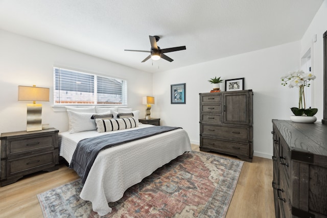 1833 Chamberlain Dr, Carrollton, TX 75007 - bedroom with light wood-style floors and ceiling fan