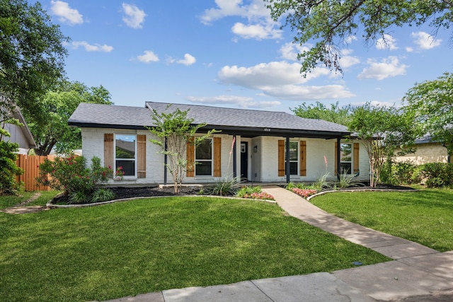 1833 Chamberlain Dr, Carrollton, TX 75007 - ranch-style house featuring covered porch, brick siding, and roof with shingles