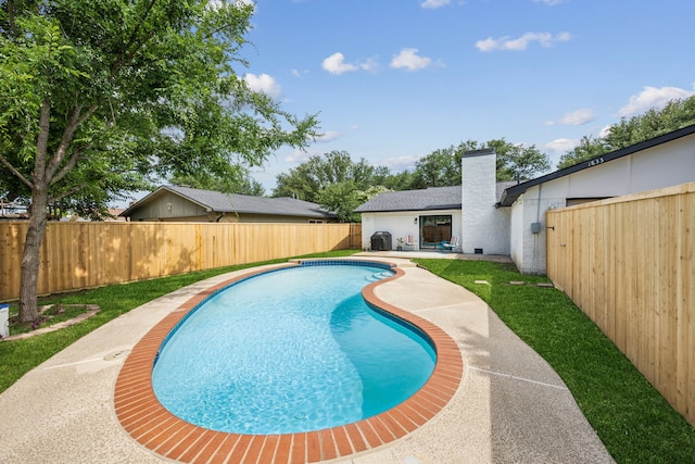 1833 Chamberlain Dr, Carrollton, TX 75007 - view of pool with a fenced backyard and a patio
