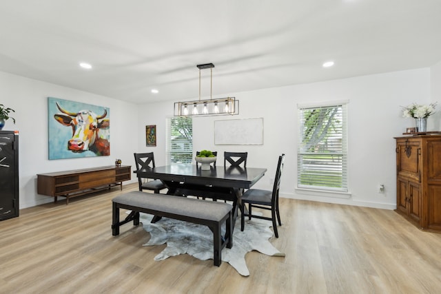 1833 Chamberlain Dr, Carrollton, TX 75007 - dining area with light wood-type flooring, plenty of natural light, baseboards, and recessed lighting