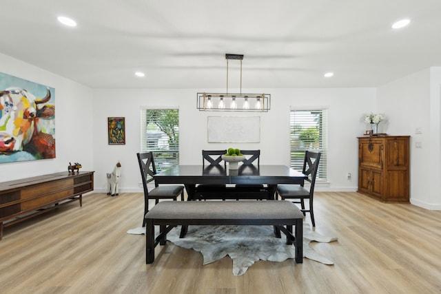 1833 Chamberlain Dr, Carrollton, TX 75007 - dining space featuring healthy amount of natural light, light wood finished floors, recessed lighting, and baseboards