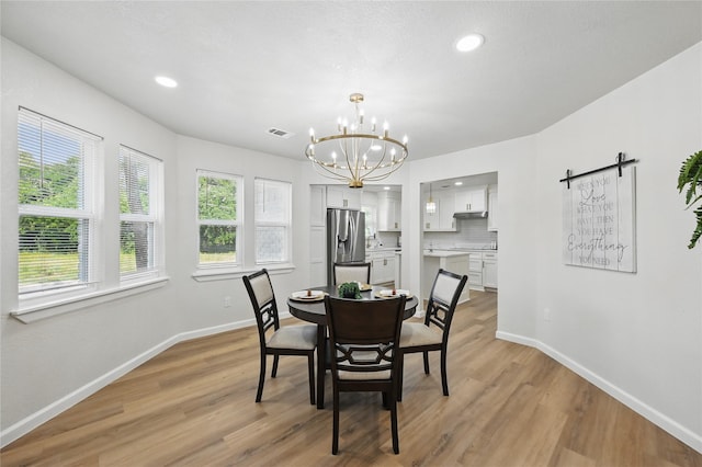 9690 Fallbrook Dr, Dallas, TX 75243 - dining space with baseboards, a chandelier, light wood-type flooring, and recessed lighting