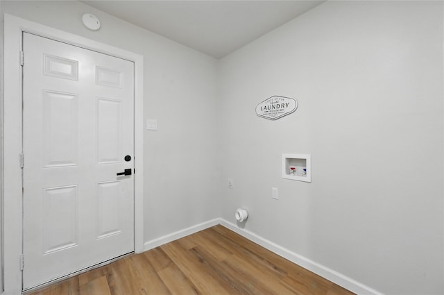 9690 Fallbrook Dr, Dallas, TX 75243 - washroom with hookup for a washing machine, wood finished floors, and baseboards
