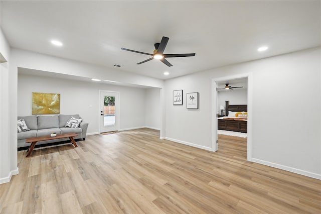 9690 Fallbrook Dr, Dallas, TX 75243 - living area with ceiling fan, light wood-style floors, recessed lighting, and baseboards