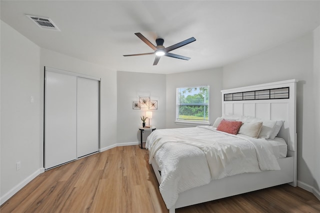 9690 Fallbrook Dr, Dallas, TX 75243 - bedroom featuring wood finished floors, baseboards, and a closet