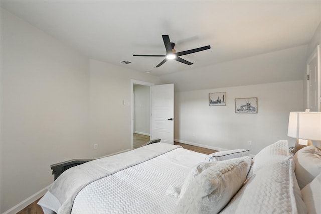 9690 Fallbrook Dr, Dallas, TX 75243 - bedroom featuring baseboards, wood finished floors, and ceiling fan