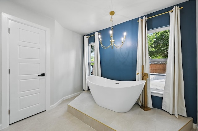 9690 Fallbrook Dr, Dallas, TX 75243 - full bathroom with a soaking tub, a chandelier, tile patterned floors, and baseboards