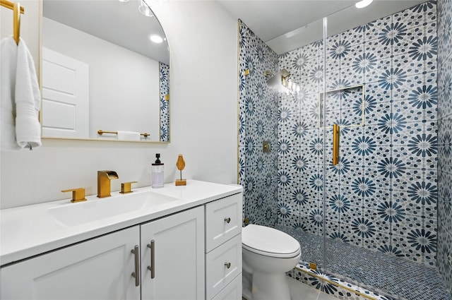 9690 Fallbrook Dr, Dallas, TX 75243 - bathroom with tiled shower, vanity, and toilet