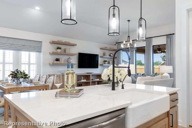 11749 Edgewood Dr, Justin, TX 76247 - kitchen with a sink, dishwasher, an island with sink, pendant lighting, and a chandelier