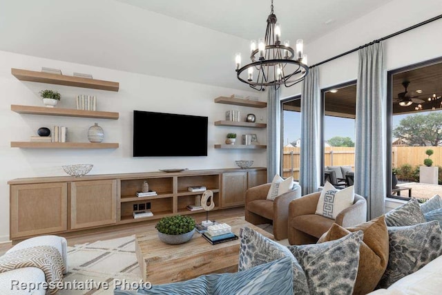 11749 Edgewood Dr, Justin, TX 76247 - living room with light wood finished floors and a chandelier