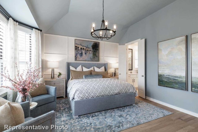 11749 Edgewood Dr, Justin, TX 76247 - bedroom featuring vaulted ceiling, a chandelier, wood finished floors, baseboards, and connected bathroom