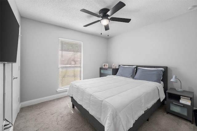 2937 Lake Park Dr, Grand Prairie, TX 75052 - bedroom with carpet floors, a textured ceiling, baseboards, and ceiling fan