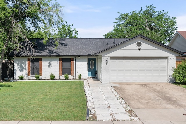 2937 Lake Park Dr, Grand Prairie, TX 75052 - single story home with brick siding, a garage, a front lawn, and concrete driveway