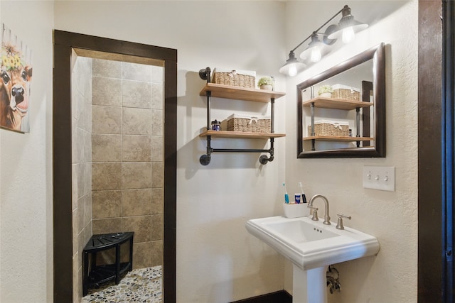 8700 Fm 920, Peaster, TX 76088 - bathroom featuring tiled shower and a wood stove