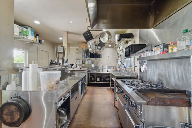 8700 Fm 920, Peaster, TX 76088 - kitchen featuring finished concrete floors, under cabinet range hood, recessed lighting, range with two ovens, and black microwave