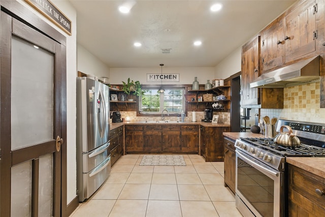 8700 Fm 920, Peaster, TX 76088 - kitchen featuring appliances with stainless steel finishes, range hood, open shelves, backsplash, and recessed lighting