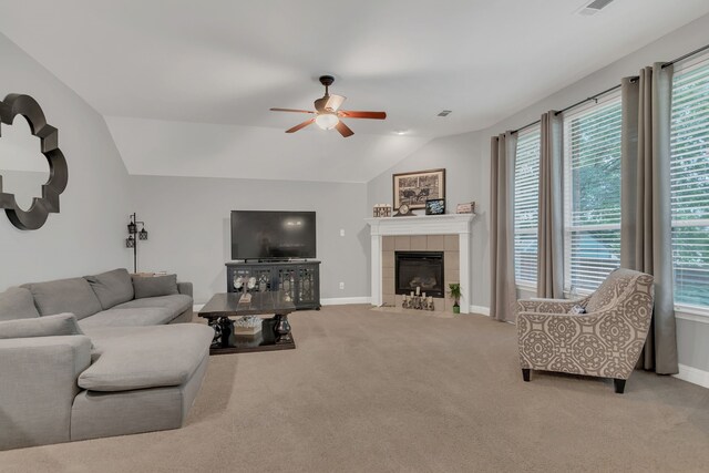 6504 Bluebird Dr, Arlington, TX 76001 - living room with a ceiling fan, baseboards, vaulted ceiling, carpet flooring, and healthy amount of natural light
