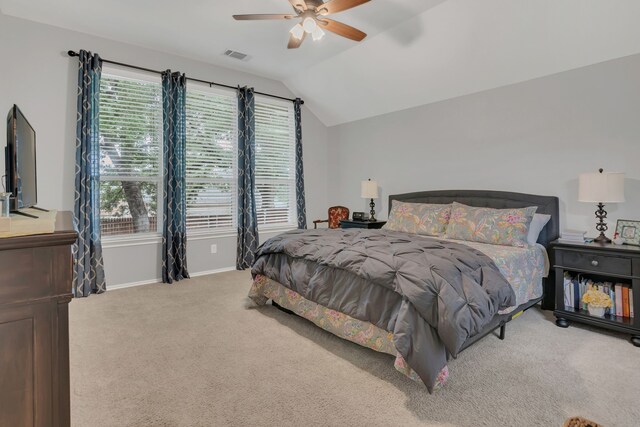 6504 Bluebird Dr, Arlington, TX 76001 - carpeted bedroom featuring vaulted ceiling, baseboards, and a ceiling fan