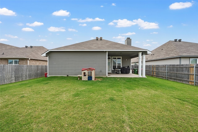3224 Risinger Rd, Waco, TX 76655 - back of property featuring a patio area and a chimney