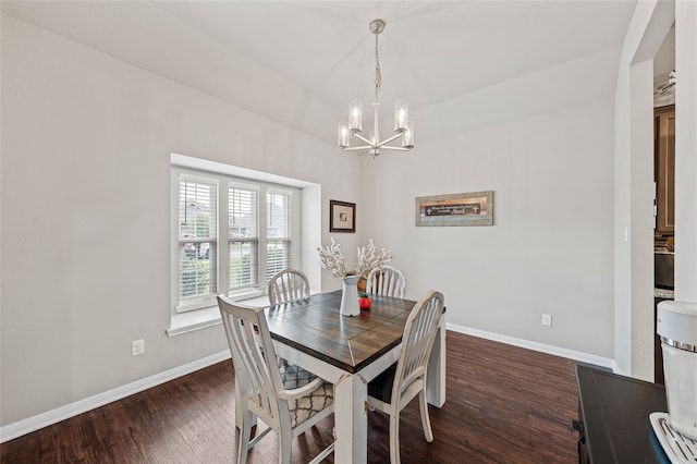 3224 Risinger Rd, Waco, TX 76655 - dining room featuring dark wood finished floors, baseboards, and a chandelier