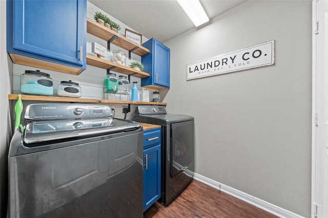 3224 Risinger Rd, Waco, TX 76655 - laundry area with washer and clothes dryer, dark wood-type flooring, baseboards, and cabinet space
