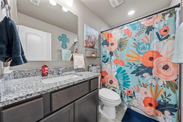 3224 Risinger Rd, Waco, TX 76655 - bathroom featuring vanity, toilet, recessed lighting, and a shower with shower curtain