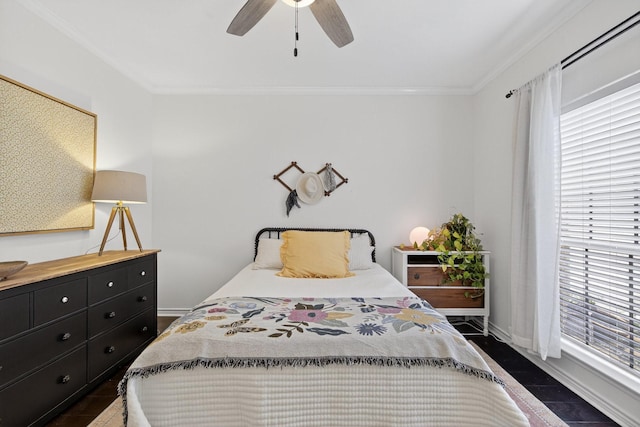 616 Crowley Rd, Arlington, TX 76012 - bedroom featuring crown molding, baseboards, and a ceiling fan