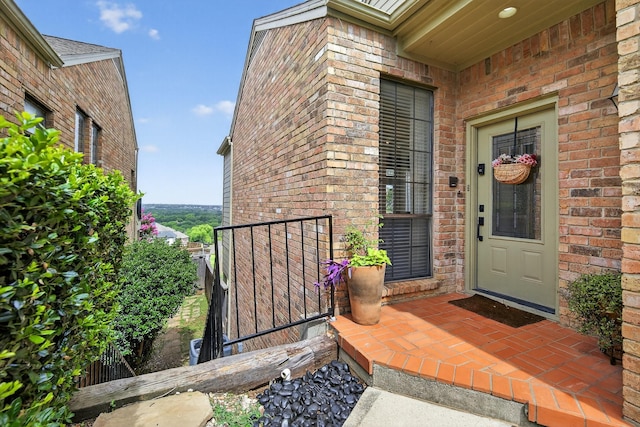 616 Crowley Rd, Arlington, TX 76012 - view of exterior entry featuring brick siding