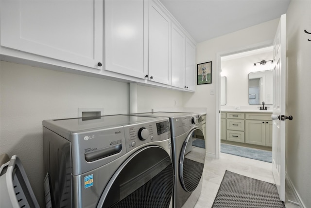 7101 Odell Ave, Rockwall, TX 75087 - laundry room with cabinet space and independent washer and dryer