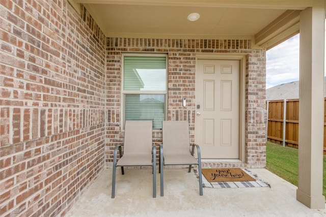 14069 Drover St, Pilot Point, TX 76258 - doorway to property with brick siding