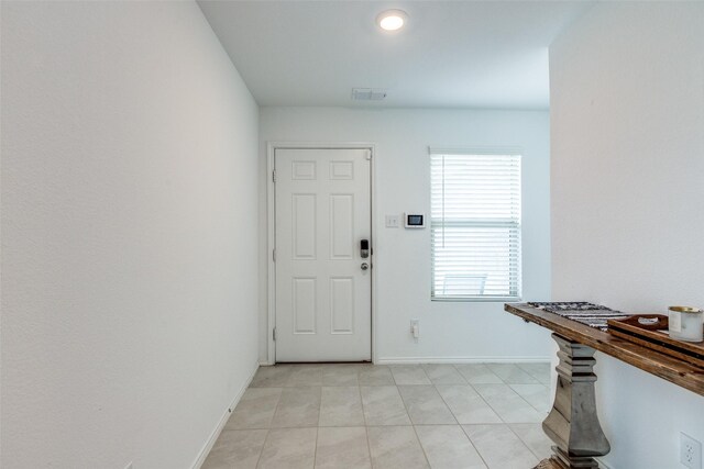 14069 Drover St, Pilot Point, TX 76258 - foyer featuring baseboards and light tile patterned floors